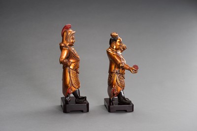 Lot 140 - A PAIR OF GILT-LACQUERED ‘HEAVENLY GUARDIAN’ WOOD FIGURES