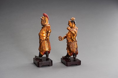 Lot 140 - A PAIR OF GILT-LACQUERED ‘HEAVENLY GUARDIAN’ WOOD FIGURES