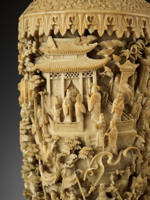 Lot 467 - A CARVED AND RETICULATED CANTON IVORY ‘MYTHICAL BATTLE’ VASE, QING DYNASTY