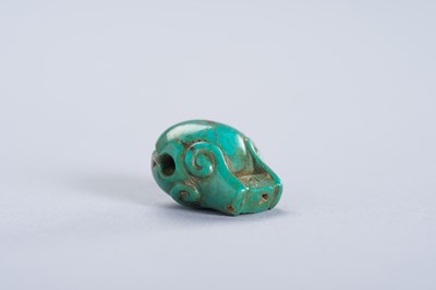 Lot 234 - A TURQUOISE MINIATURE PENDANT OF A TEMPLE BELL