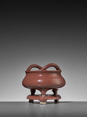 Lot 92 - A RARE IRON-RUST GLAZED TRIPOD CENSER WITH MATCHING STAND, MID-QING