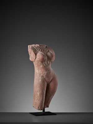 Lot 586 - A RED SANDSTONE TORSO OF A LADY, 10TH CENTURY