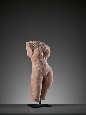 Lot 586 - A RED SANDSTONE TORSO OF A LADY, 10TH CENTURY