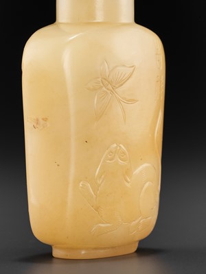 Lot 296 - A YELLOW JADEITE ‘CAT AND BUTTERFLY’ SNUFF BOTTLE, QING DYNASTY