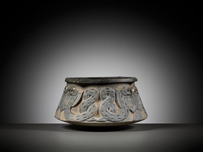 Lot 691 - A WESTERN ASIATIC ‘SNAKE AND BIRD’ CHLORITE VESSEL, 3RD MILLENNIUM BC