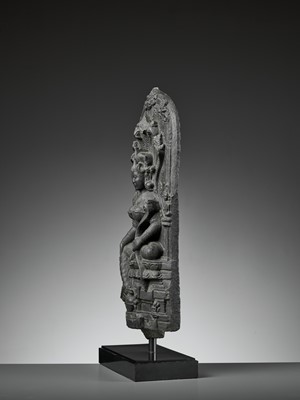 Lot 595 - A RARE BLACK STONE STELE DEPICTING MANASA, PALA PERIOD