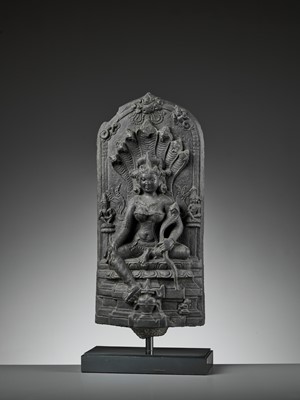 Lot 595 - A RARE BLACK STONE STELE DEPICTING MANASA, PALA PERIOD