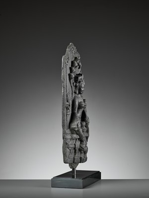Lot 595 - A RARE BLACK STONE STELE DEPICTING MANASA, PALA PERIOD