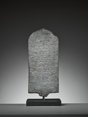 Lot 595 - A RARE BLACK STONE STELE DEPICTING MANASA, PALA PERIOD