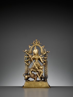 Lot 609 - A BRASS SHRINE DEPICTING DURGA SLAYING THE BUFFALO