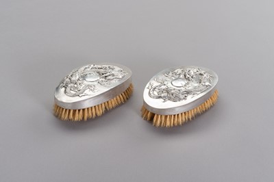 Lot 171 - A PAIR OF TWO CHINESE EXPORT SILVER MOUNTED CLOTHES BRUSHES