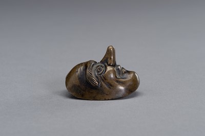 Lot 14 - A BRONZE SCROLL WEIGHT IN THE SHAPE OF A NOH MASK