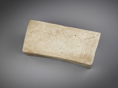 Lot 153 - A RARE DING CARVED ‘LOTUS’ PILLOW, SONG DYNASTY