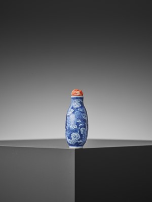 Lot 321 - AN ‘EIGHT BUDDHIST LIONS’ PORCELAIN SNUFF BOTTLE, QING DYNASTY