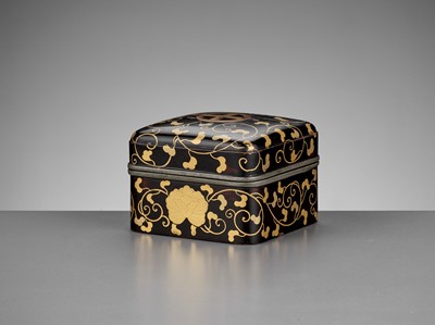 Lot 1045 - A RARE BLACK AND GOLD-LACQUERED KOBAKO AND COVER WITH SHIMAZU MONS