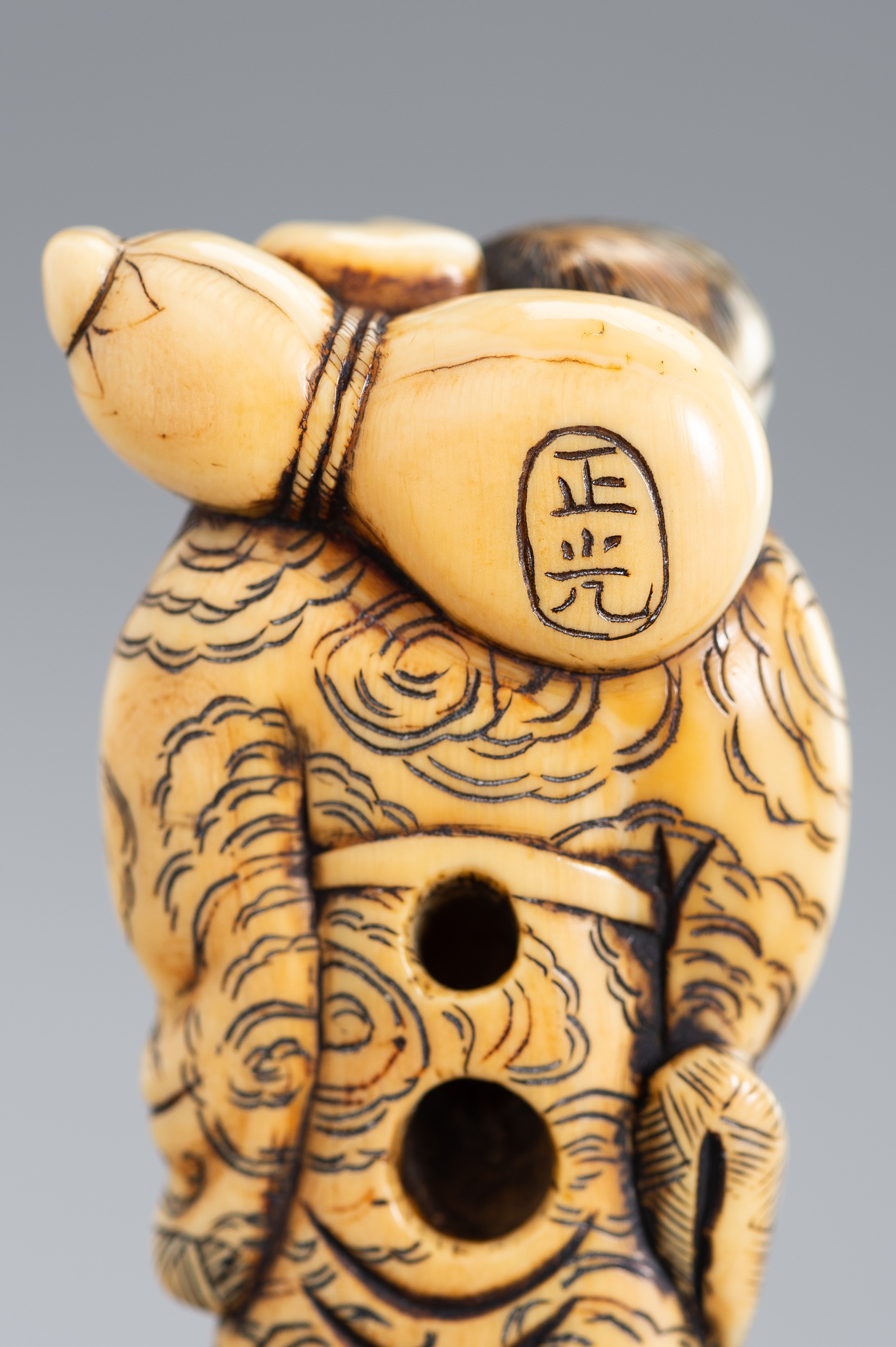 Lot 430 - MASAMITSU: A KYOTO SCHOOL IVORY NETSUKE OF