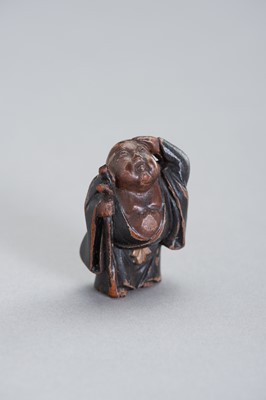 Lot 547 - A FINE WOOD AND LACQUER NETSUKE OF HOTEI