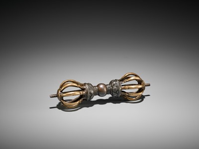 Lot 426 - A GILT-BRONZE AND IRON VAJRA, 17TH CENTURY