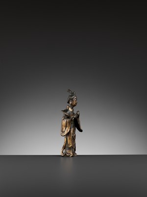 Lot 30 - A PARCEL-GILT BRONZE FIGURE OF A FLUTIST, SONG TO MING DYNASTY