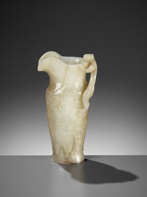 Lot 100 - AN IMPERIAL CELADON AND RUSSET JADE ‘CHILONG’ RHYTON, QIANLONG MARK AND PERIOD