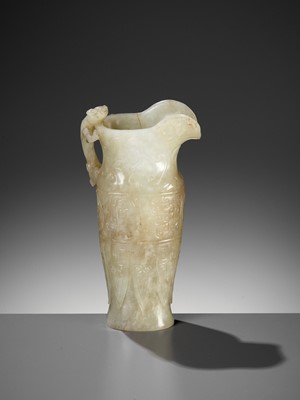 Lot 100 - AN IMPERIAL CELADON AND RUSSET JADE ‘CHILONG’ RHYTON, QIANLONG MARK AND PERIOD