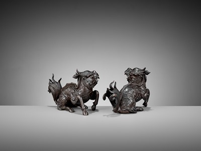 Lot 357 - A PAIR OF BRONZE FIGURES OF QILIN, MING DYNASTY