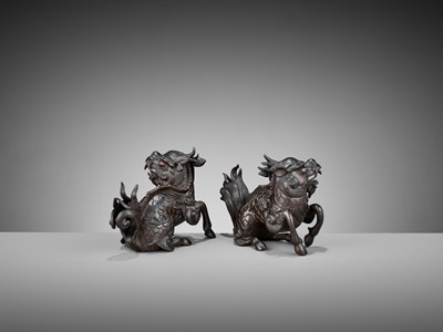 Lot 357 - A PAIR OF BRONZE FIGURES OF QILIN, MING DYNASTY