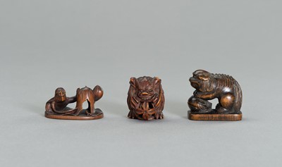 Lot 562 - THREE WOOD NETSUKE OF MYTHICAL BEINGS
