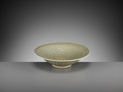 Lot 700 - A YAOZHOU CARVED CELADON ‘LOTUS’ BOWL, NORTHERN SONG DYNASTY