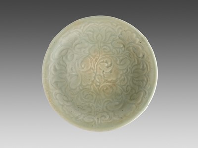 Lot 700 - A YAOZHOU CARVED CELADON ‘LOTUS’ BOWL, NORTHERN SONG DYNASTY