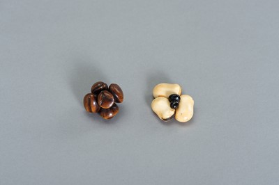 Lot 475 - TWO IVORY AND WOOD NETSUKE OF LEGUMES AND NUTS