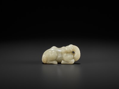 Lot 87 - A PALE YELLOW JADE FIGURE OF A CAMEL, MING DYNASTY