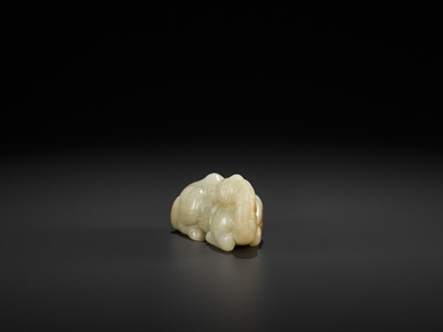 Lot 87 - A PALE YELLOW JADE FIGURE OF A CAMEL, MING DYNASTY