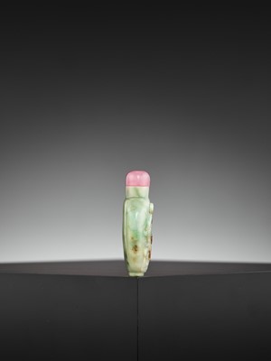 Lot 300 - A GREEN AND RUSSET JADE ‘CHILONG AND BIRD’ SNUFF BOTTLE, QING DYNASTY