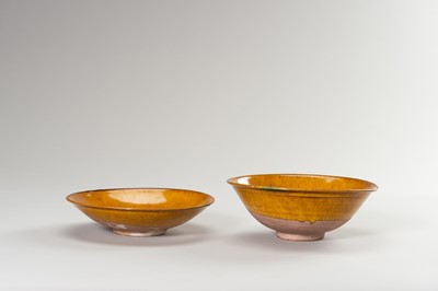 Lot 710 - TWO YELLOW EARTHENWARE ‘HARE’S FUR’ DISHES