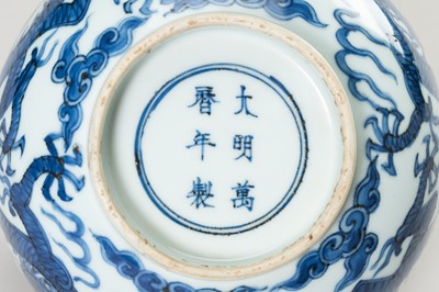 Lot 812 - A BLUE AND WHITE PORCELAIN ‘DRAGON’ BOWL