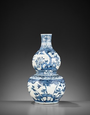 Lot 204 - A BLUE AND WHITE ‘THREE FRIENDS OF WINTER’ DOUBLE-GOURD VASE, 17TH CENTURY
