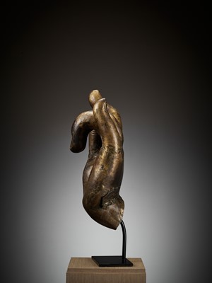 Lot 402 - A MASSIVE LACQUER-GILT COPPER REPOUSSÉ ‘KARANA MUDRA’ HAND OF BUDDHA, MING TO EARLY QING