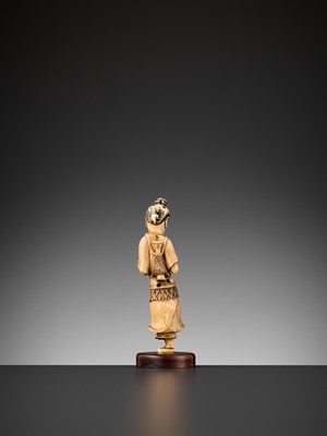 Lot 469 - AN IVORY FIGURE OF A LAN CAIHE, MING DYNASTY