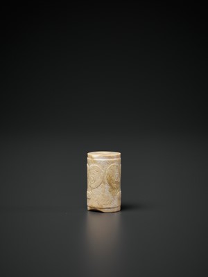 Lot 91 - A CARVED CYLINDRICAL JADE BEAD, LIANGZHU CULTURE