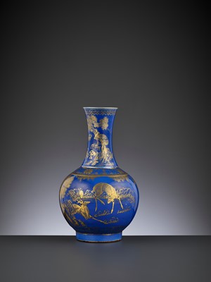 Lot 273 - A POWDER-BLUE-GROUND GILT-DECORATED ‘DEER AND CRANE’ BOTTLE VASE, GUANGXU MARK AND PERIOD
