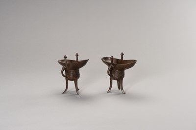 A RARE PAIR OF ARCHAISTIC BRONZE JUE QIANLONG MARK AND PERIOD