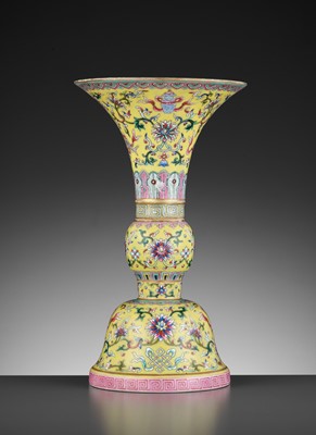 Lot 868 - A FAMILLE-ROSE YELLOW-GROUND ‘BAJIXIANG’ ALTAR VASE, GU, LATE QING TO REPUBLIC