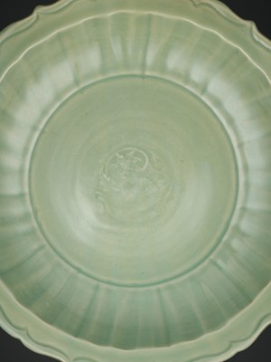 Lot 244 - A LONGQUAN CELADON BARBED-RIM CHARGER, MING DYNASTY