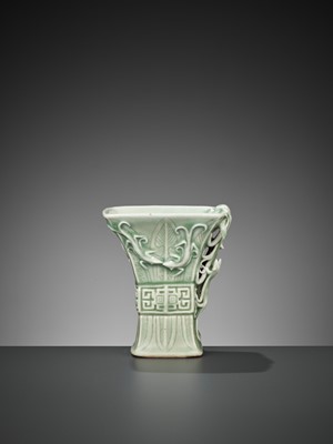 Lot 221 - A PALE CELADON-GLAZED ARCHAISTIC ‘LIBATION’ CUP, QIANLONG PERIOD