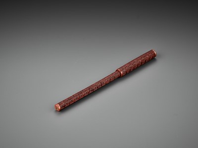 Lot 453 - A CARVED RED LACQUER BRUSH AND COVER, LATE MING DYNASTY