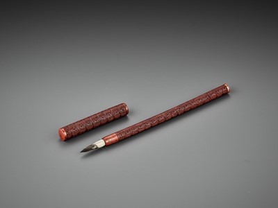 Lot 453 - A CARVED RED LACQUER BRUSH AND COVER, LATE MING DYNASTY