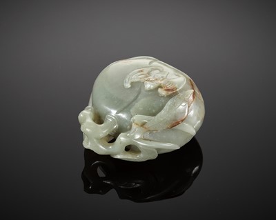 Lot 102 - A DEEP CELADON AND RUSSET JADE ‘PEACH AND BAT’ GROUP, EARLY QING DYNASTY