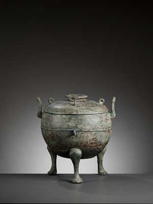 Lot 355 - A LARGE ARCHAIC BRONZE RITUAL FOOD VESSEL AND COVER, DING, WARRING STATES