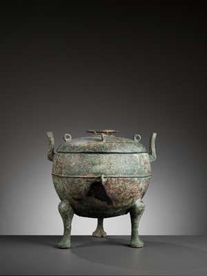 Lot 355 - A LARGE ARCHAIC BRONZE RITUAL FOOD VESSEL AND COVER, DING, WARRING STATES
